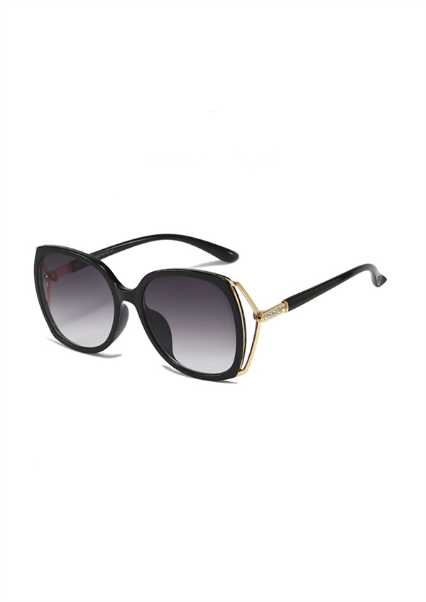 Skøn sort solbrille med guldstel fra Just D\'Lux